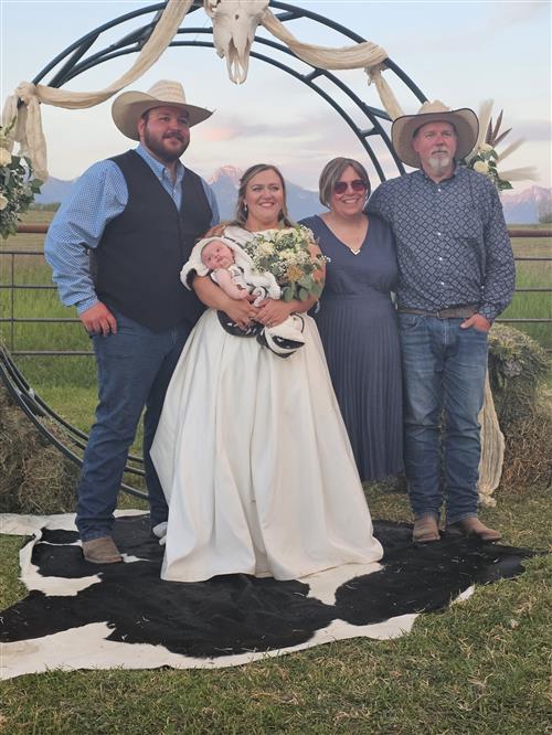 Mrs. Arnott with husband at daughter's wedding